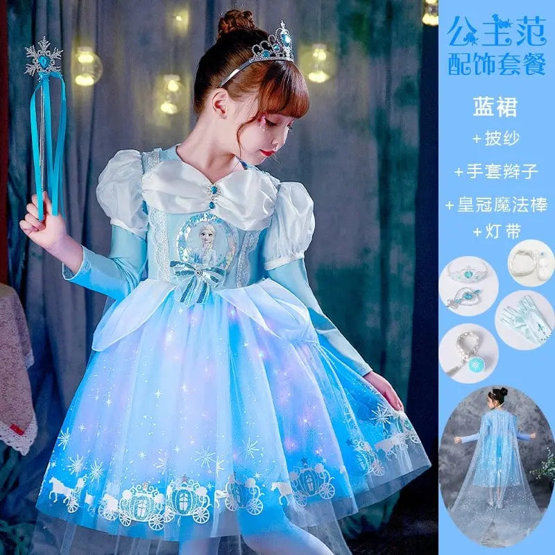 Girl wearing YISMALL Elsa princess dress, sleeveless summer cotton vest and skirt, featuring a snowy princess design.