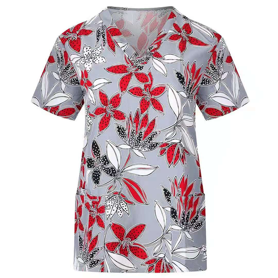 Showlu printed nurse scrub top with breathable fabric, featuring a colorful hospital and dental-themed pattern for healthcare professionals.
