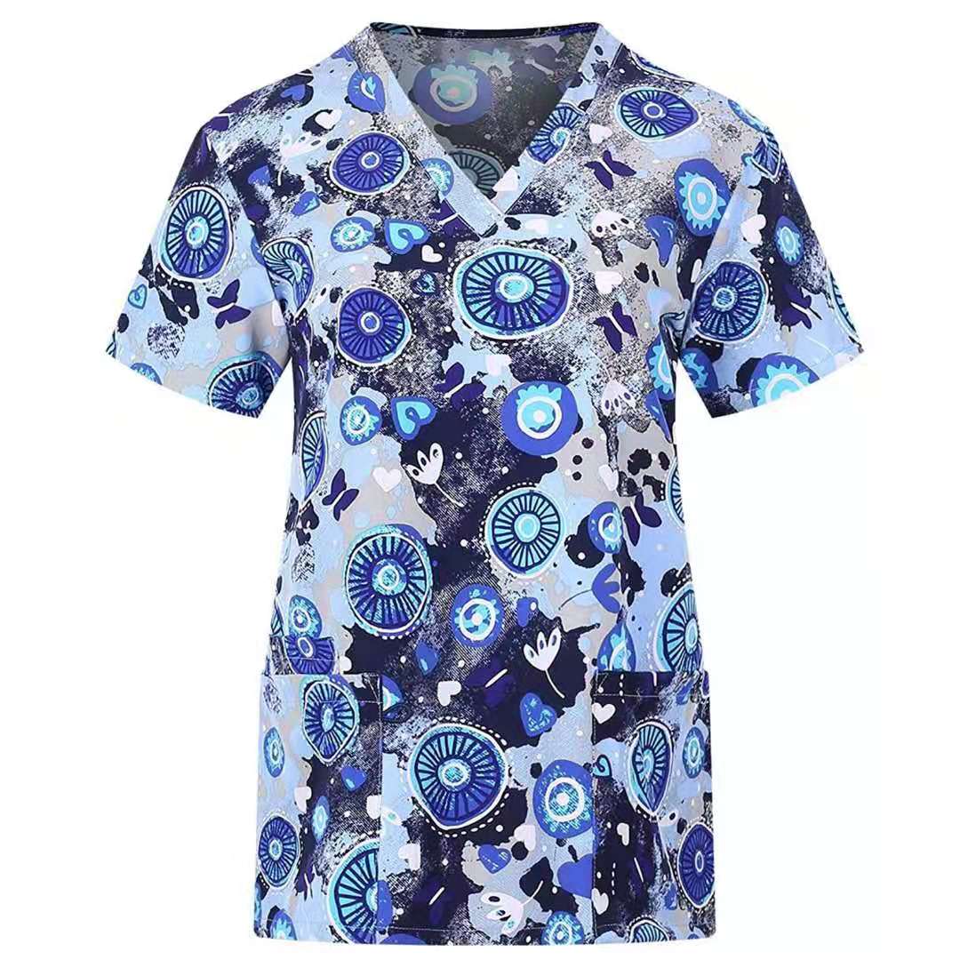 Showlu printed nurse scrubs top with breathable fabric, featuring a colorful hospital and dental staff pattern for medical professionals.