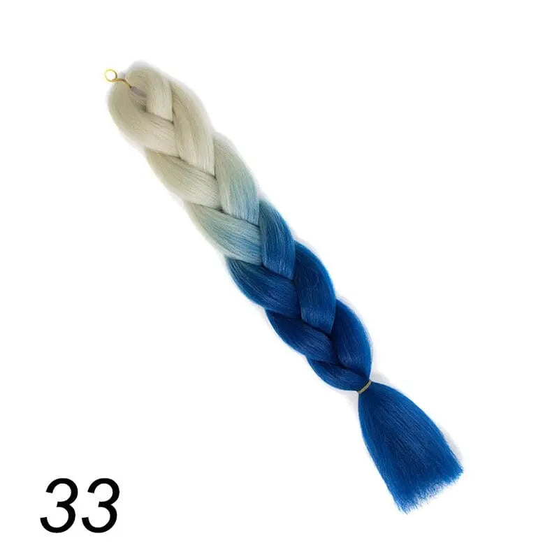 24-inch ombre pre-stretched Kanekalon jumbo braiding extensions from QP Hair, showing vibrant color and textured synthetic hair strands.