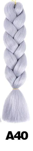24-inch ombre pre-stretched Kanekalon jumbo braiding extensions by QP Hair, shown in a bundle of synthetic hair braids.