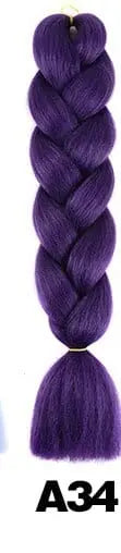 24-inch ombre pre-stretched Kanekalon jumbo braiding extensions by QP Hair, shown in natural braid style.