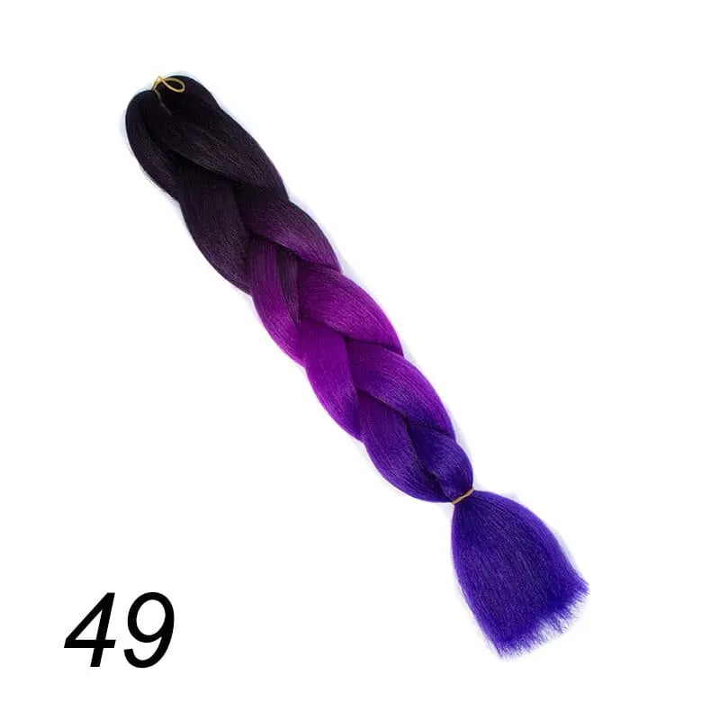 24-inch ombre pre-stretched Kanekalon jumbo braiding extensions by QP Hair, showing vibrant ombre color and textured synthetic braids.