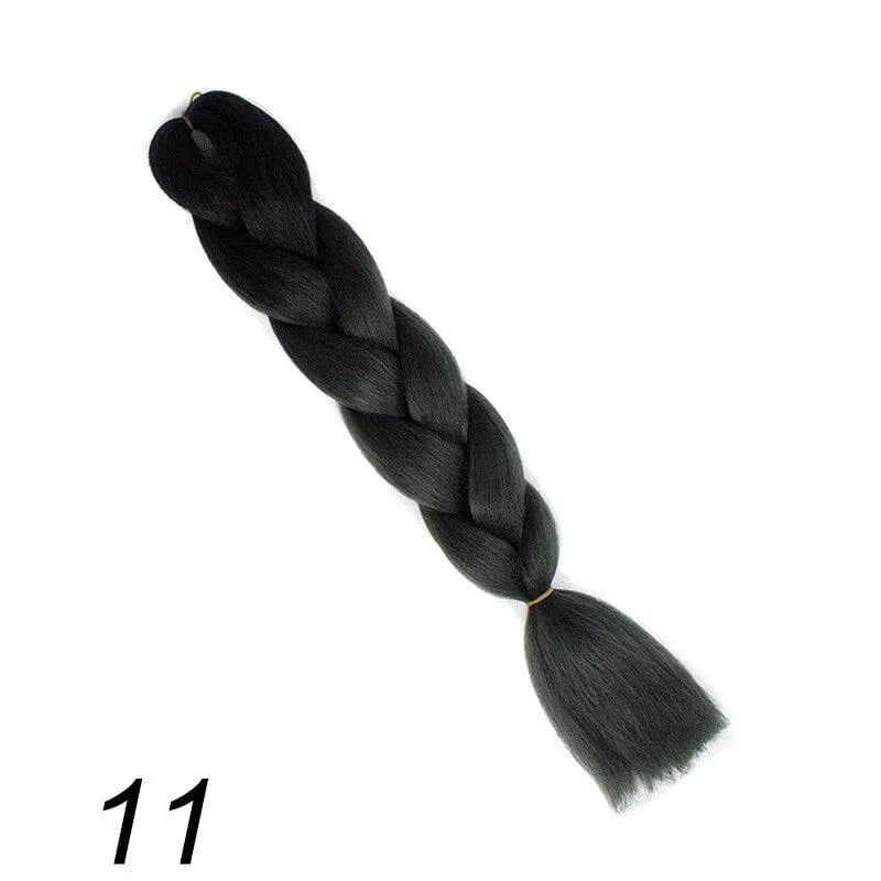 24-inch ombre pre-stretched Kanekalon jumbo braiding extensions from QP Hair, showcasing vibrant color and textured synthetic braids.