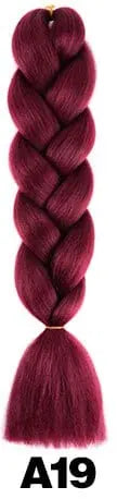 Showlu Store Nation 24-inch ombre pre-stretched Kanekalon jumbo braiding extensions in colorful synthetic hair for braiding.