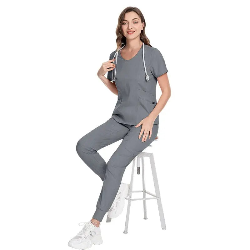 Showlu long sleeve zip-up medical scrubs set with pockets, designed for doctors and nurses, in a winter uniform style.