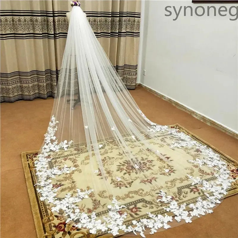 White lace edge Synoneke cathedral wedding veil with comb, one layer, ivory appliqued, perfect for bridal and wedding attire.