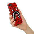 White Libra white TPU silicone iPhone case with red camouflage shark mouth design, durable and protective tech accessory.