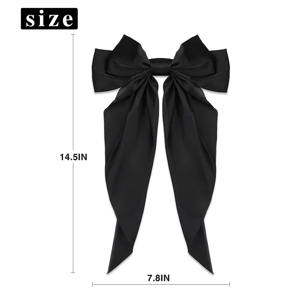 Two elegant satin bow ribbon hair clips for women and girls, featuring solid bowknot design and secure hairpin barrettes.