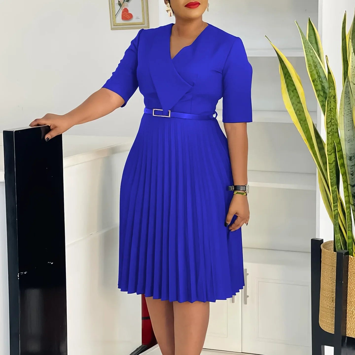 Showlu women's V-neck pleated African maxi dress in plus size, elegant evening gown with flowing fabric and stylish design.