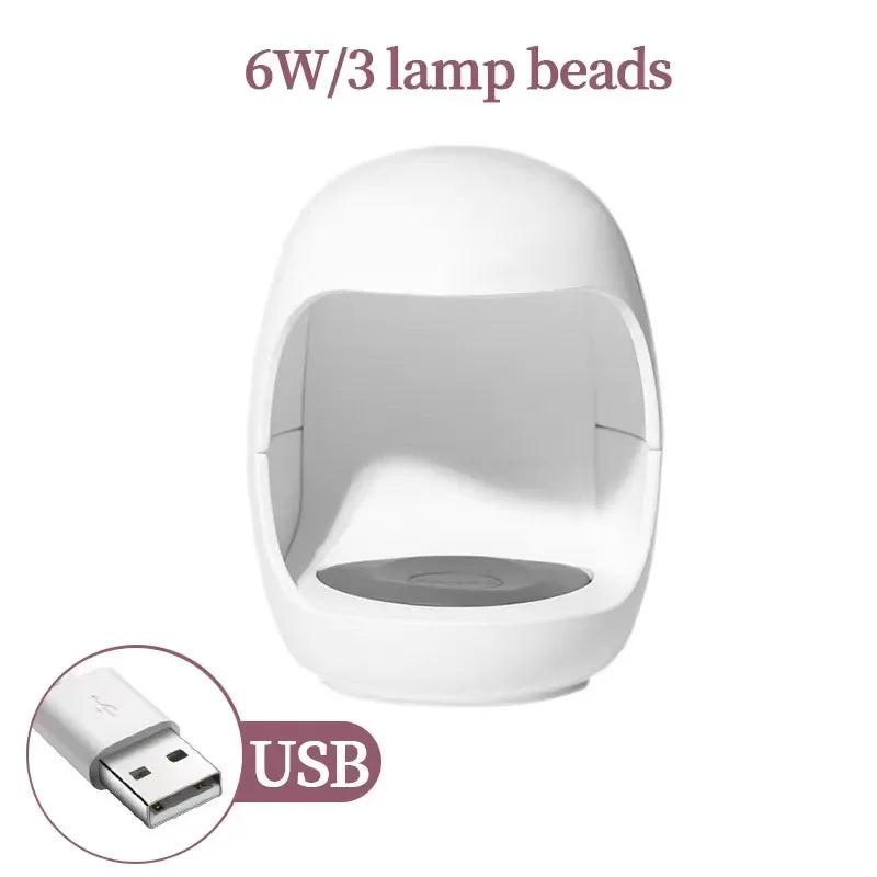 Showlu Smart General LED Nail Dryer Mini, compact device with multiple drying LED lights for quick, efficient gel nail curing.