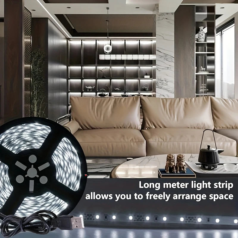 Flexible USB LED strip light in warm white, 5V, Showlu Smart General brand, shown as a slim tape illuminated in a close-up shot.
