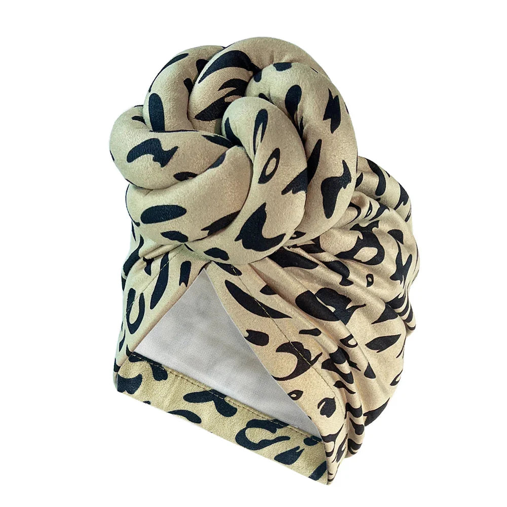 SHOWLU Knotted Head Wrap with luxury floral polyester design, stylish party headdress, perfect for fashionable events.