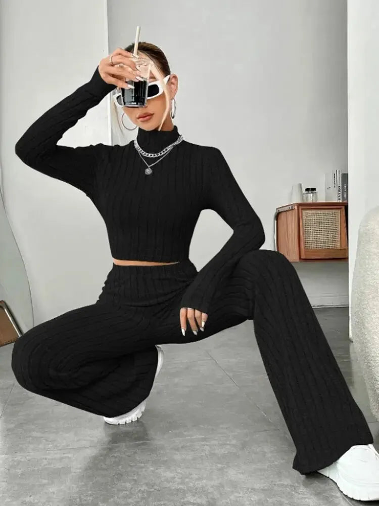 Stand collar Navel T-shirt and trumpet pants from Showlu Fashion Store, featuring a stylish top and wide-leg trousers.