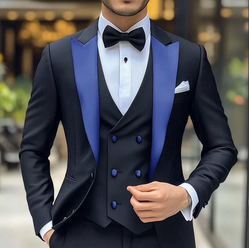 Black groom wedding tuxedo 3-piece suit with blazer, vest, and pants featuring slim fit and peak lapel, stylish formal men's attire