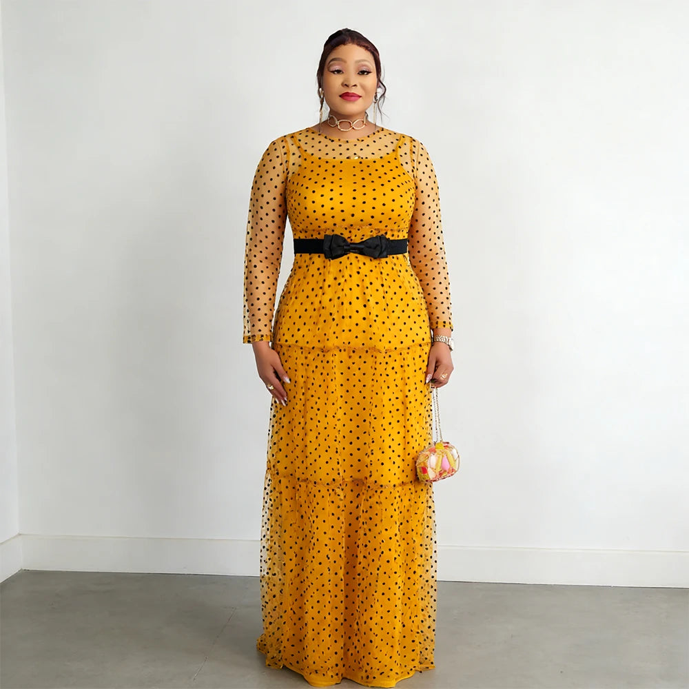Elegant African Dashiki Ankara party dress for women featuring vibrant traditional patterns and bright colors.