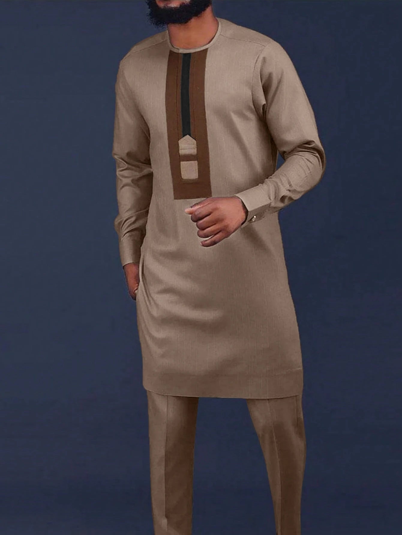 White Kaunda suit for men, traditional African 2-piece cotton set featuring white fabric, tailored fit, and cultural design elements.