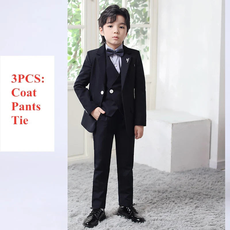 Luoobeibeic boys 3-piece plaid formal suit with tuxedo jacket, vest, and pants for kids wedding attire, shown in image.