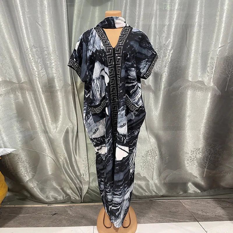 Elegant 2026 African dress for women featuring traditional Dashiki Ankara fabric and a long, flowing gown style.