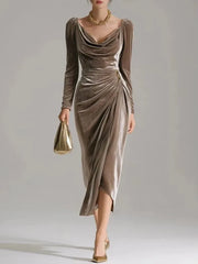 A long-sleeved taupe velvet midi dress with a draped cowl neckline and a pleated side-split skirt.