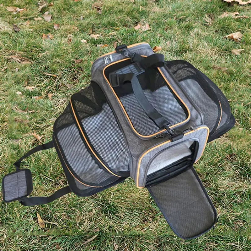 Showlu Fashion foldable pet carrier bag for cats, portable travel bag with mesh sides and sturdy handle for easy transport.