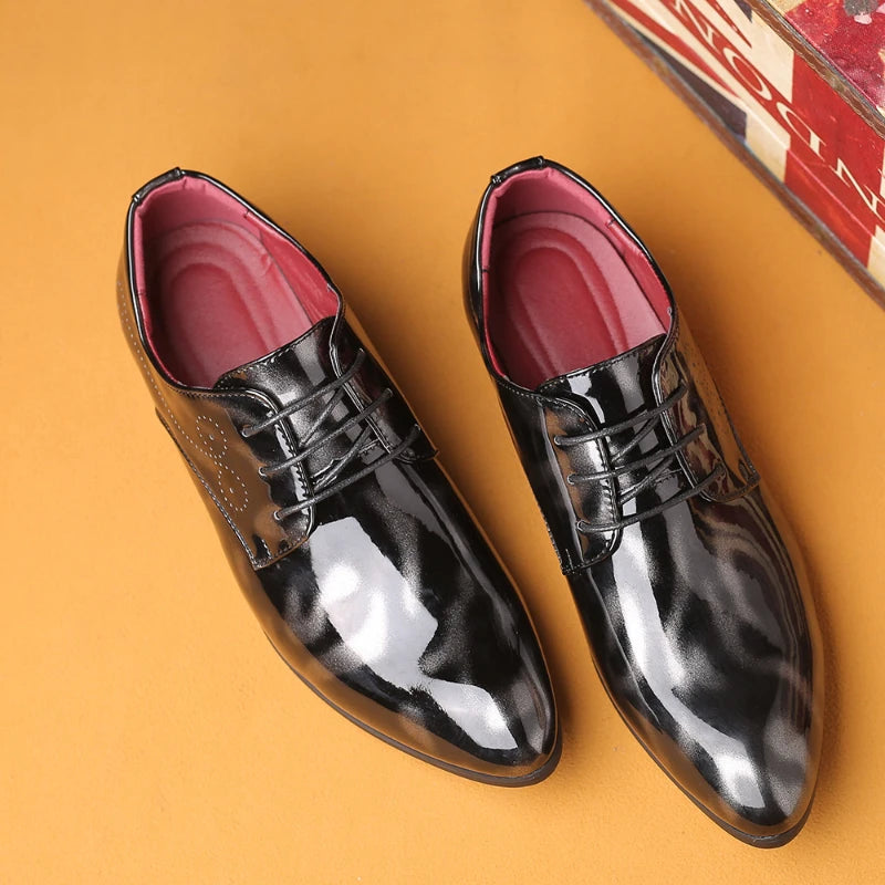 Wine red patent leather men's formal dress shoes with pointed toes, lace-up business oxfords for weddings and special occasions.