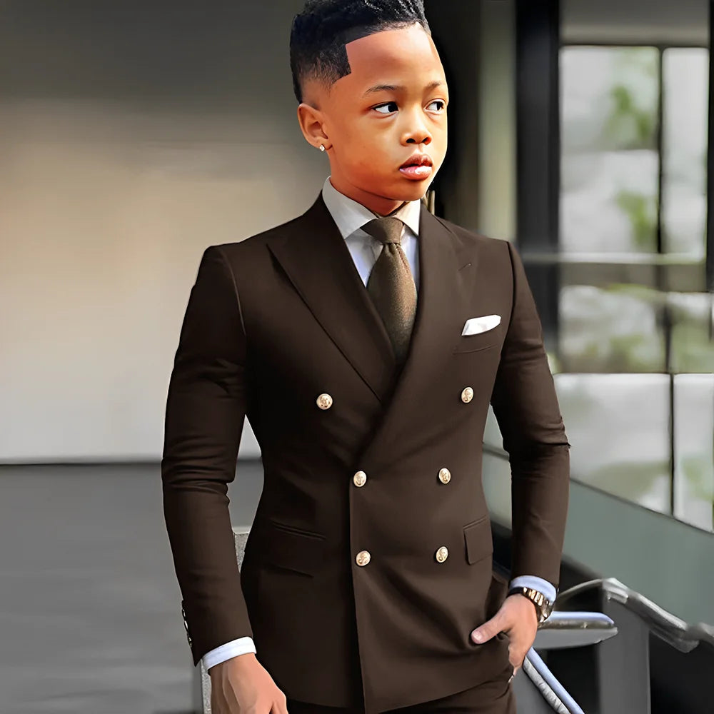 Navy blue solid boy's tuxedo suit with peak lapel, double-breasted jacket, tailored for formal events and weddings by Showlu Fashion