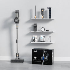An INSE S9 cordless stick vacuum cleaner with its accessories displayed on shelves and in a box.