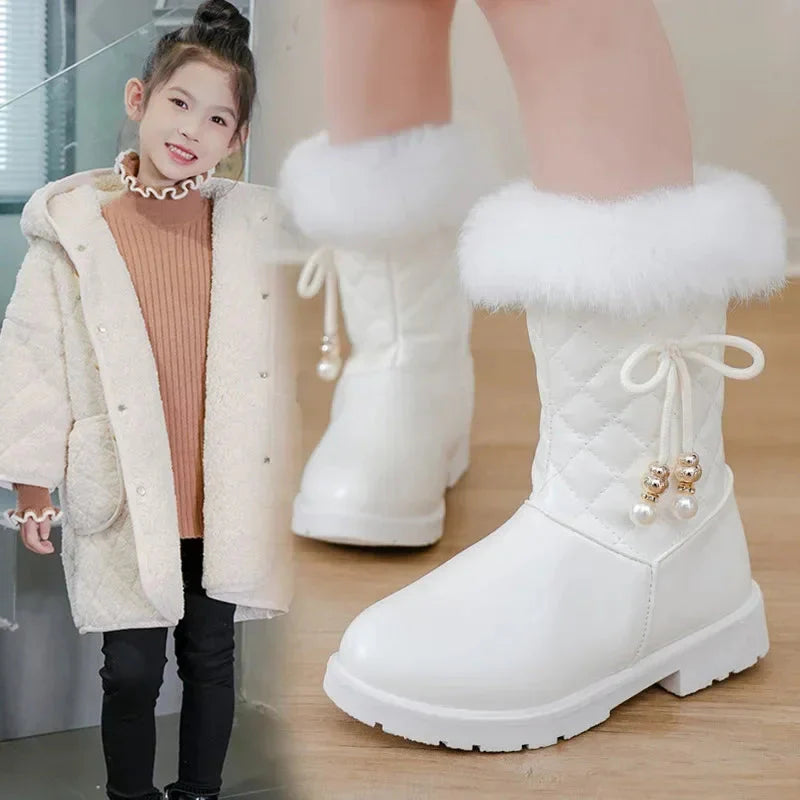 Girls' winter snow boots by SHOWLU FASHION STORE, mid-calf PU leather boots with bow detail for cold weather.