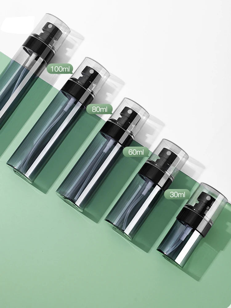 Showlu Smart General oil control spray bottle with a clear nozzle and compact design for skincare or hair oil control.