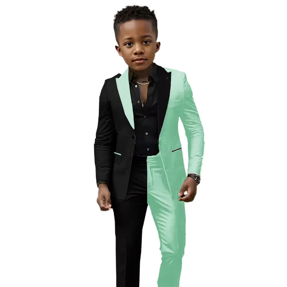 Showlu Fashion boys wedding suit 2-piece black and white spliced slim fit tuxedo for ages 2T-16T, ideal for Easter, prom, or birthday.