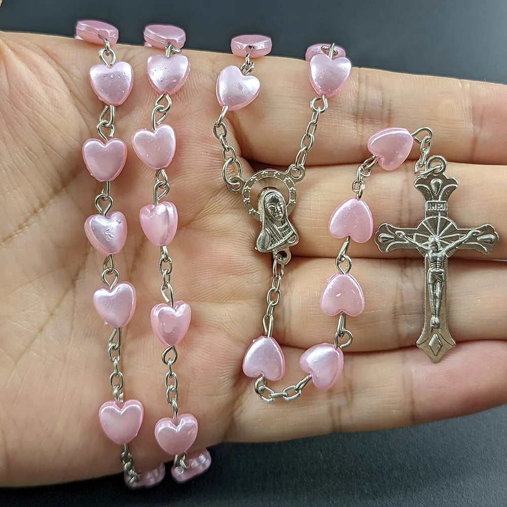 Pink heart Christian rosary beads necklace for women with Virgin Mary and INRI cross pendant, religious prayer jewelry.