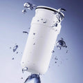 Showlu universal faucet water purifier with washable ceramic filter element attached to a kitchen faucet.