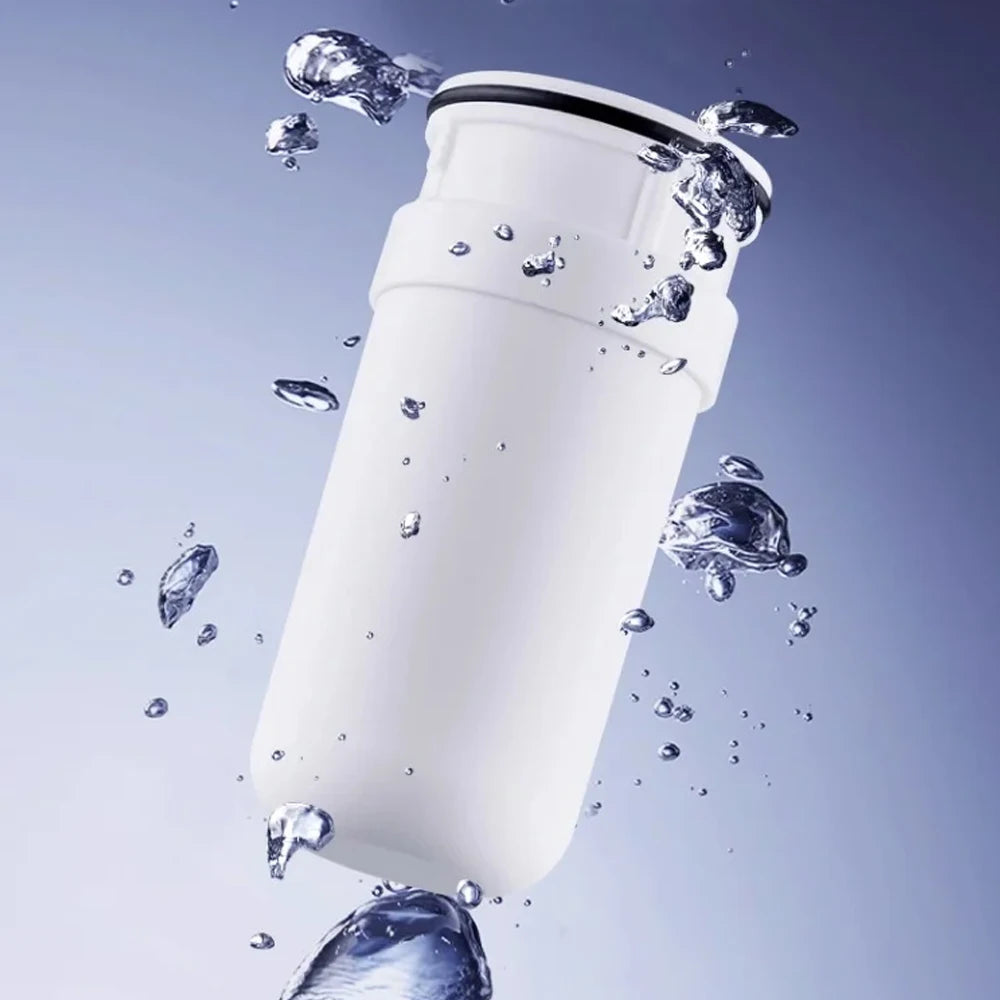 Showlu universal faucet water purifier with washable ceramic filter element attached to a kitchen faucet.
