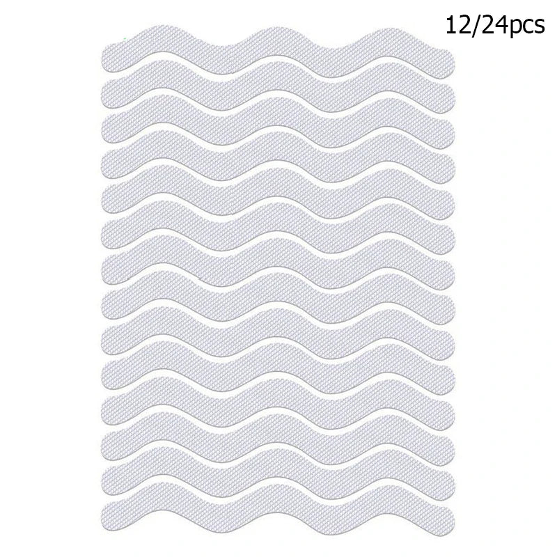 Showlu Smart General anti-slip shower stickers on a bathroom floor for safer, slip-resistant shower surfaces.