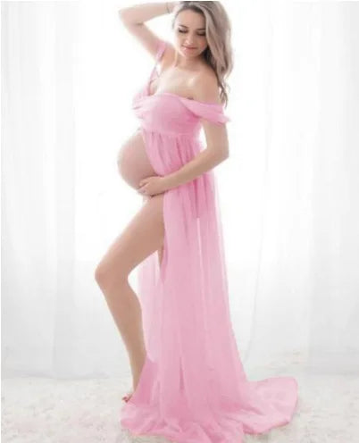 Sexy deep V-neck maternity dress by Showlu Fashion with tulle, lace, long sleeves, and feather details for photo shoots.