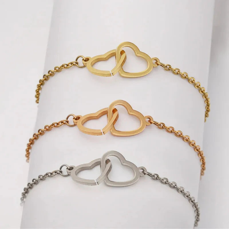 SHOWLU FASHION double heart steel bracelet with eternal rose box, featuring elegant jewelry design and romantic gift presentation.