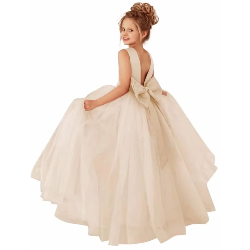 Dusty pink flower girl dress with pearl belt and ball gown silhouette, perfect for weddings, by Showlu Fashion Store.