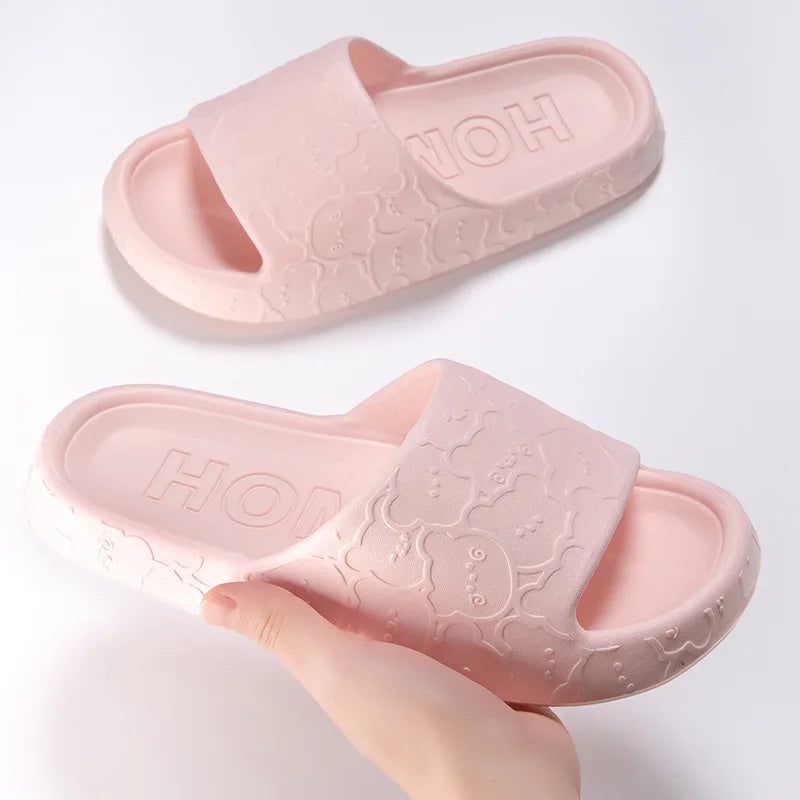 Cute women's cloud home slippers with bear design, soft sole, non-slip Eva beach slides for indoor and summer wear.