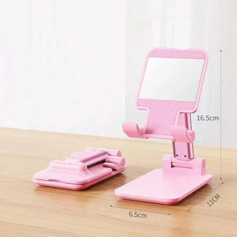 Foldable mobile phone holder stand from Showlu Fashion Store, adjustable and flexible desk mount for all smartphones.