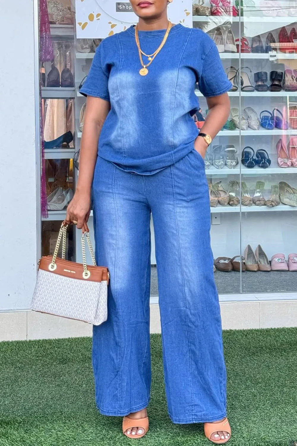 Plus size blue Tencel denim two-piece pant set for women by Showlu Fashion, featuring a stylish matching top and pants.