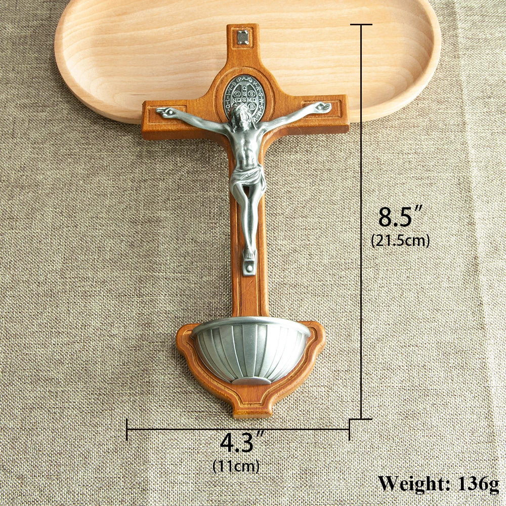 Wooden Catholic church cross with Jesus crucifix, Holy Water cup, and spiritual religious details, ideal for church or home decoration.