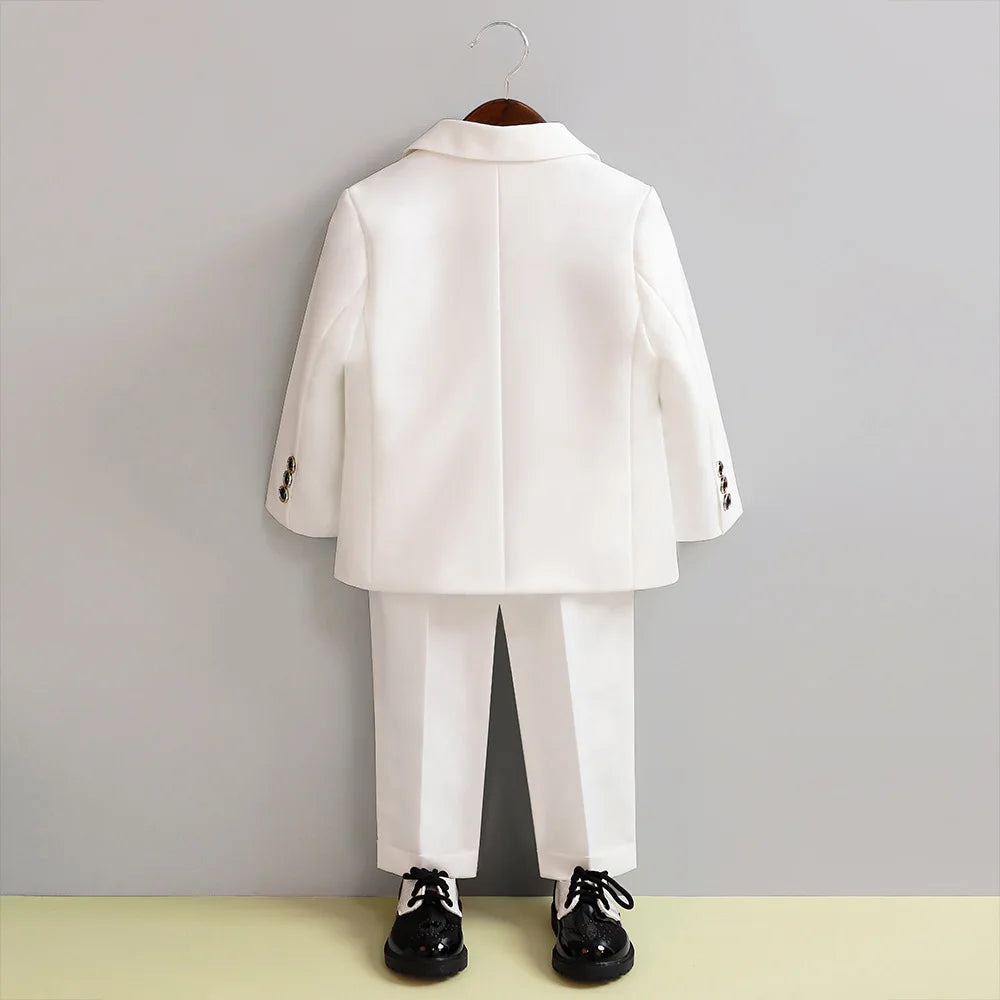 Children's white wedding suit with jacket, pants, and bowtie, ideal for flower boys, birthdays, and formal parties.