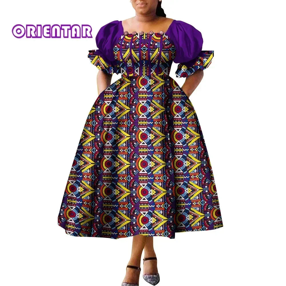 African print puff sleeve high waist Ankara cotton gown by SHOWLU FASHION STORE featuring vibrant patterns and elegant design.