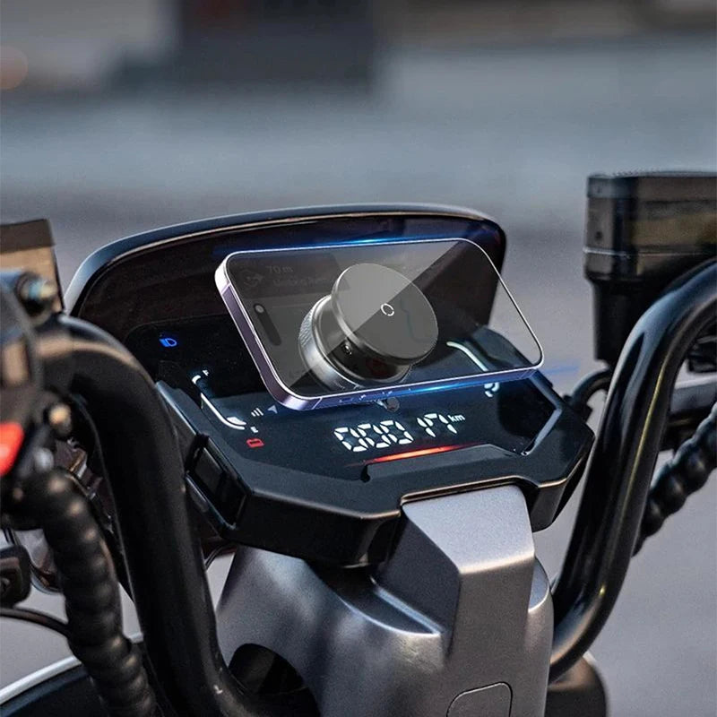 Showlu Smart General Car Phone Holder 360° rotating mount secured to a dashboard, holding a smartphone for easy access while driving.
