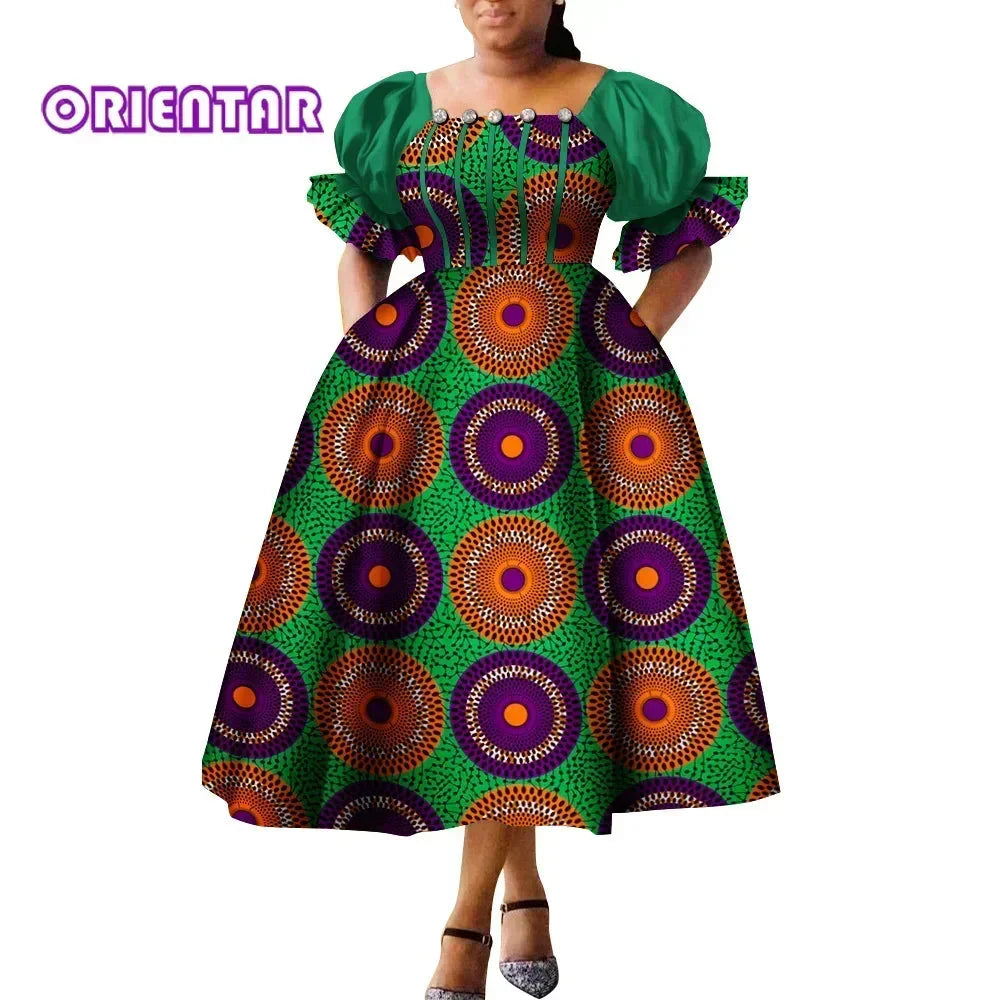 African print puff sleeve high waist Ankara cotton gown from SHOWLU FASHION STORE featuring vibrant colors and traditional floral patterns.