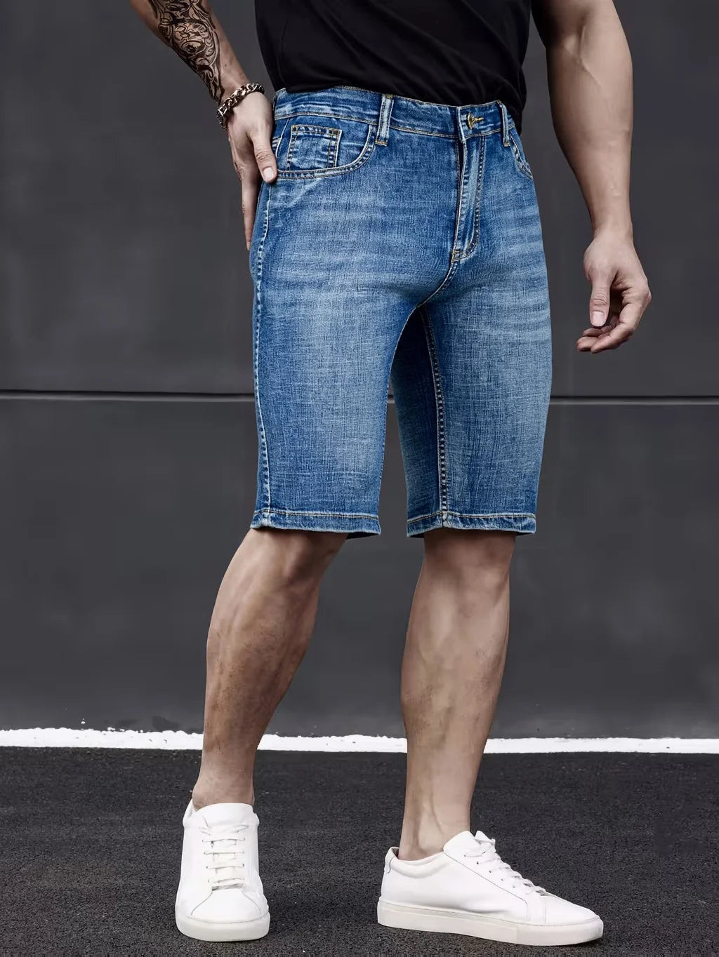 Slim fit men's denim shorts by Showlu Fashion, classic style, lightweight stretch fabric, casual summer shorts in size 40.