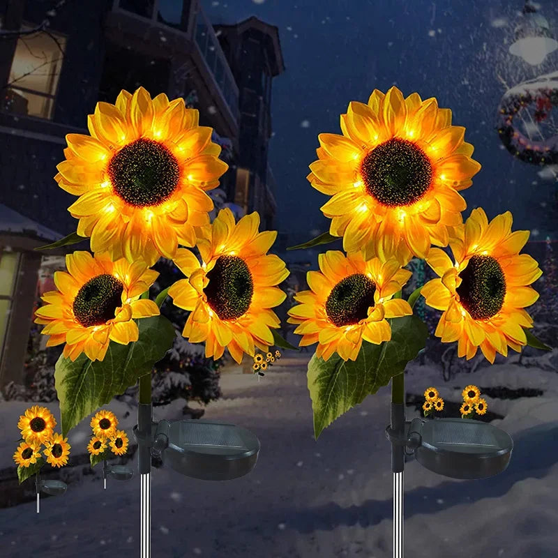 Showlu Smart General solar sunflower LED garden light shining in a garden with vibrant yellow petals and bright illumination.