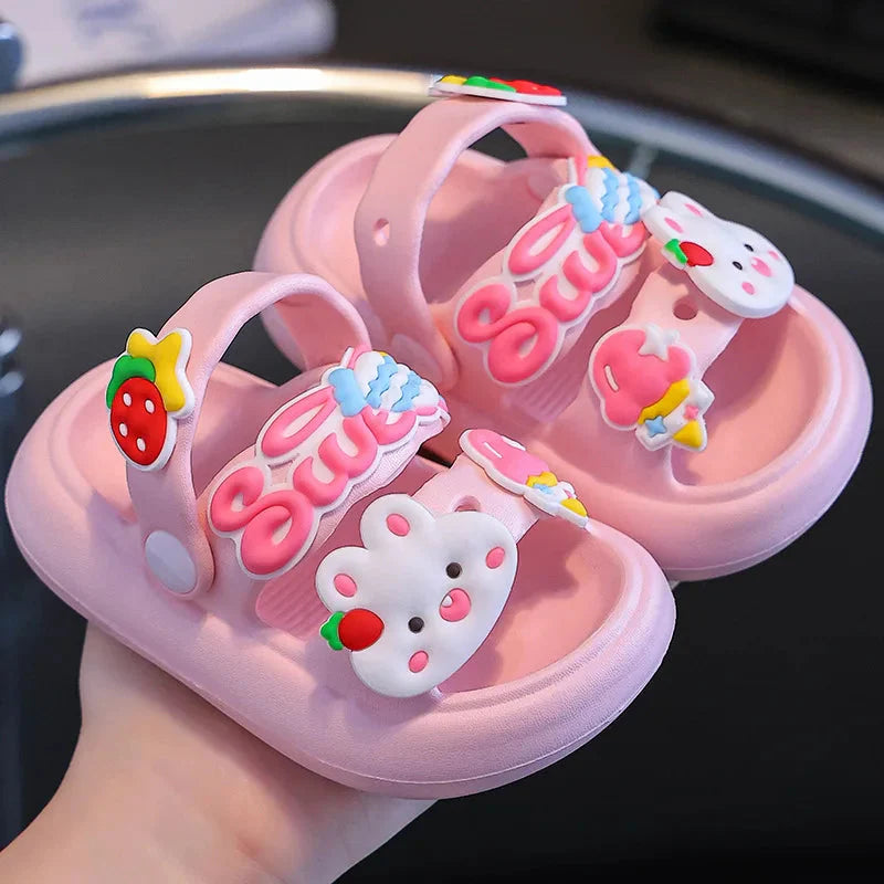 Kids cartoon rabbit sandals by Shijunyi with non-slip soft soles, perfect for beach and outdoor play.