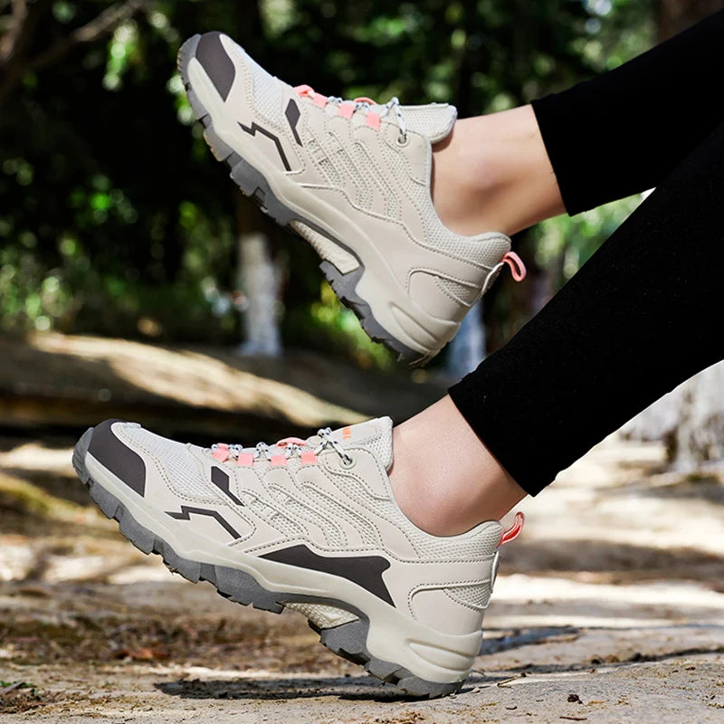 Unisex 2025 waterproof hiking shoes by Showlu Fashion Store with non-slip soles, ideal for outdoor sports and camping.
